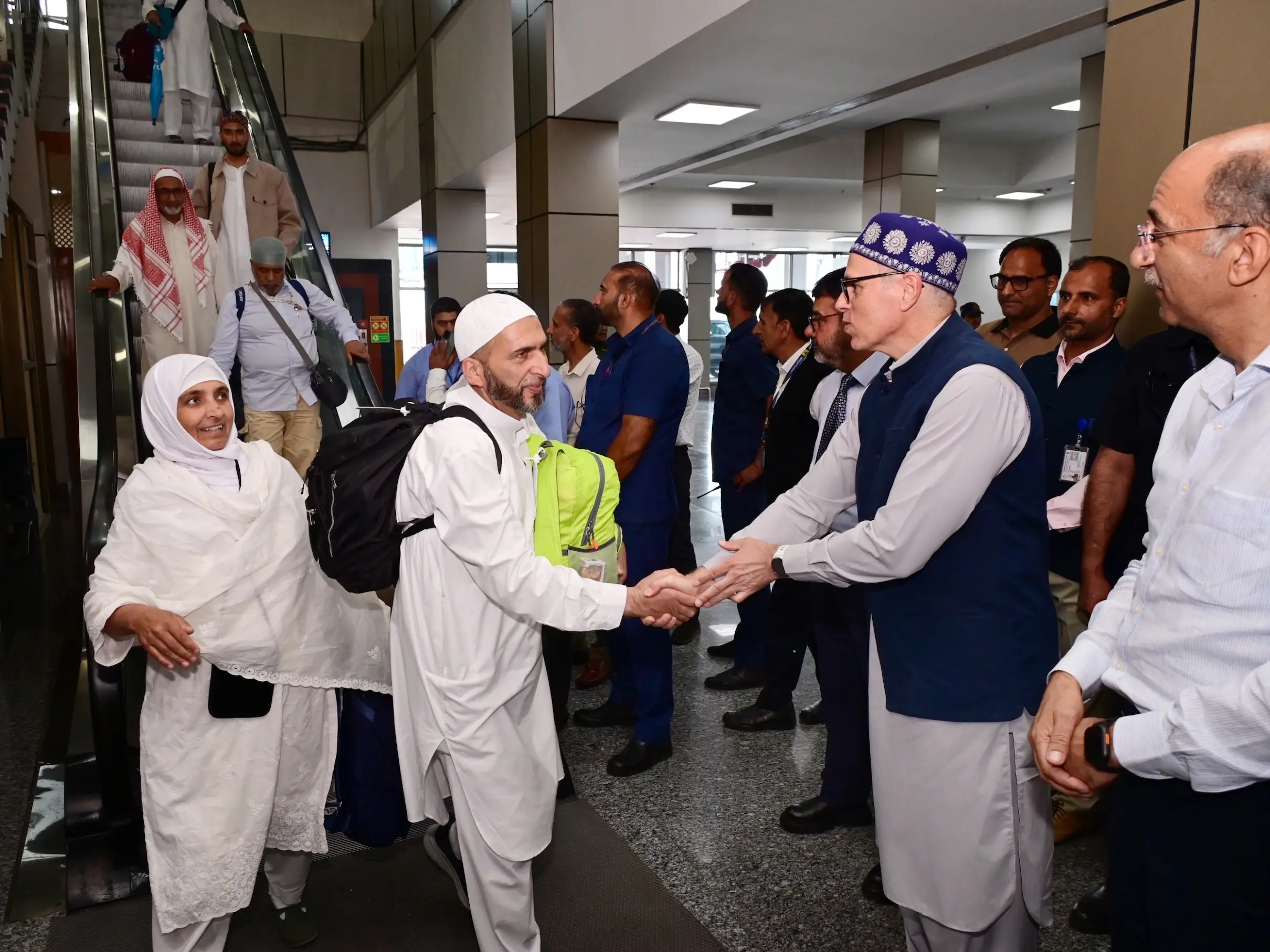 Jammu and Kashmir CM Omar Abdullah welcomes first batch of Haj-2026 pilgrims at Srinagar airport Jammu and Kashmir CM Omar Abdullah welcomes first batch of Haj-2026 pilgrims at Srinagar airport