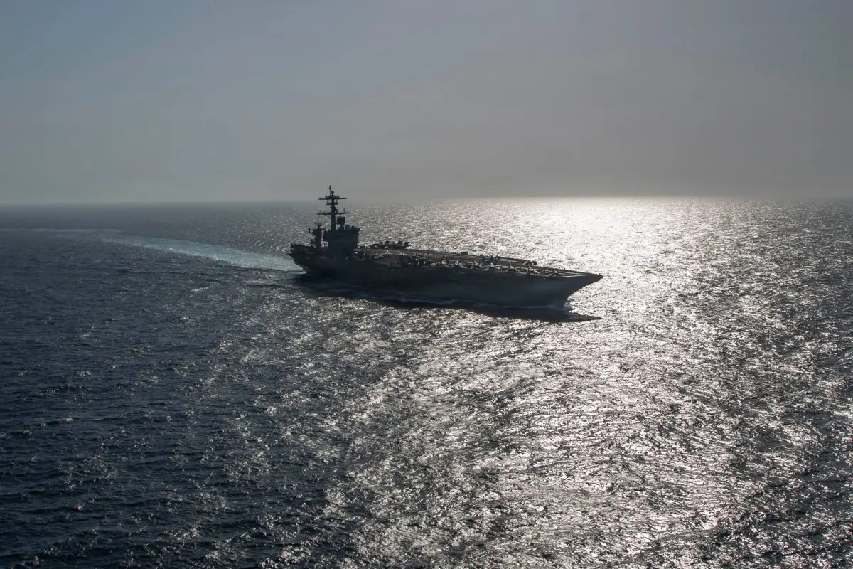 Iran says it fired missiles and drones at US warships in Gulf of Oman, claims USS Tripoli retreated