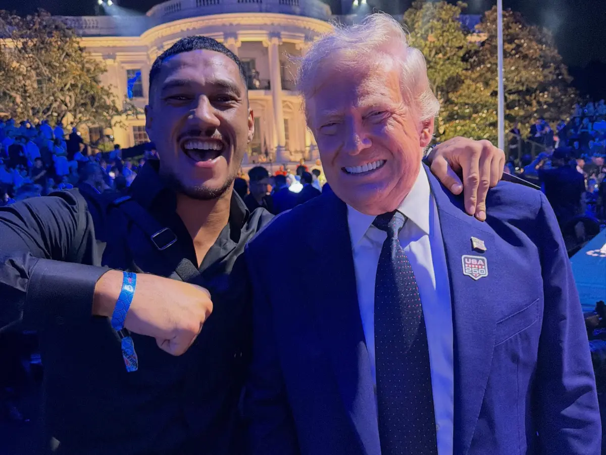 Boxer Jai Opetaia put his hand on Trump's shoulder, adding fuel to speculations about president's suit Boxer Jai Opetaia put his hand on Trump's shoulder, adding fuel to speculations about president's suit