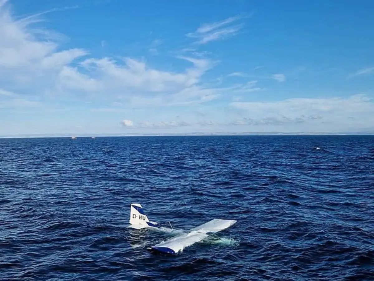 Passengers found perched on wing of airplane that crashed in the sea in Wales Passengers found perched on wing of airplane that crashed in the sea in Wales