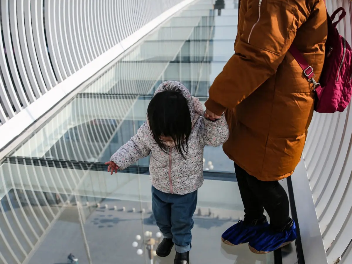 Glass bridge in China cracks after being poked with an umbrella, official says it is safe