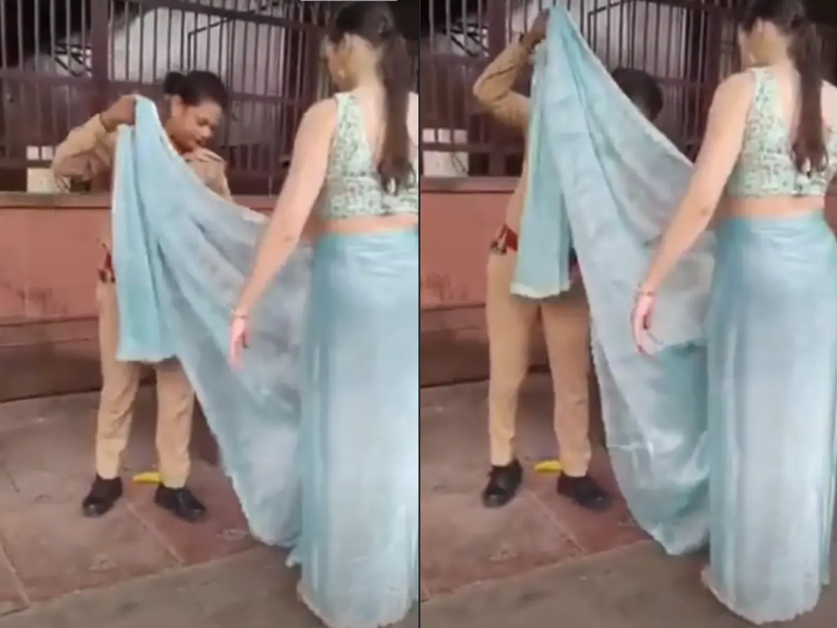 'Atithi devo bhava': Agra constable helps foreign tourist drape saree at Taj Mahal; heartwarming video goes viral | WATCH 'Atithi devo bhava': Agra constable helps foreign tourist drape saree at Taj Mahal; heartwarming video goes viral | WATCH