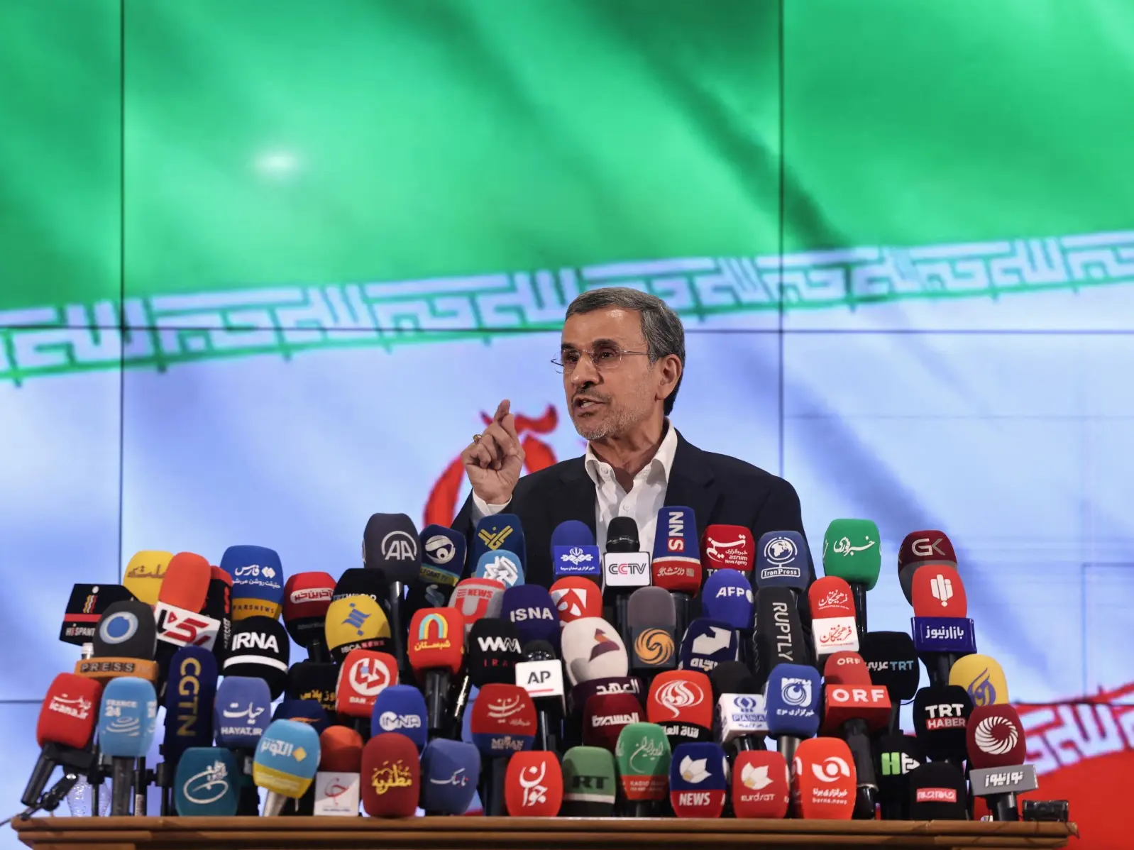 Mahmoud Ahmadinejad seen in Tehran memorial after report claimed IRGC put him under house arrest Mahmoud Ahmadinejad seen in Tehran memorial after report claimed IRGC put him under house arrest