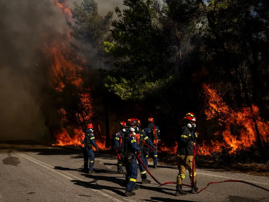 Wildfires rage across Greece and Croatia as tourists flee; firefighters battle flames and smoke