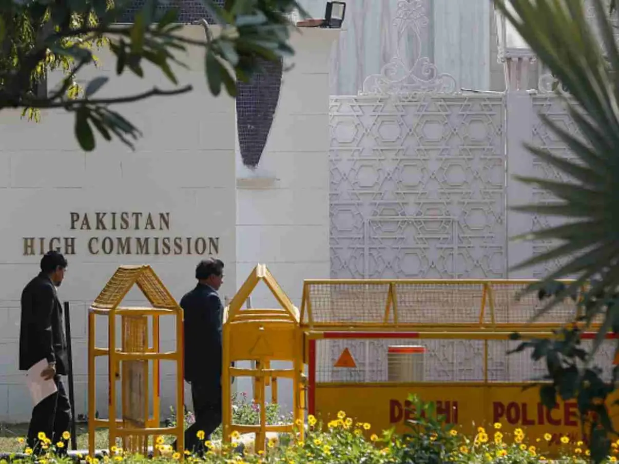 Authorities clear unauthorised structures outside Pakistan High Commission after poles removed near Indian mission in Islamabad Authorities clear unauthorised structures outside Pakistan High Commission after poles removed near Indian mission in Islamabad