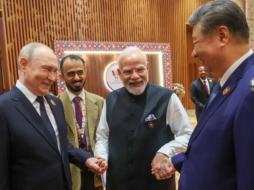 Modi, Putin, Xi ‘bromance’ goes viral as leaders captured holding hands at BRICS Summit Modi, Putin, Xi ‘bromance’ goes viral as leaders captured holding hands at BRICS Summit