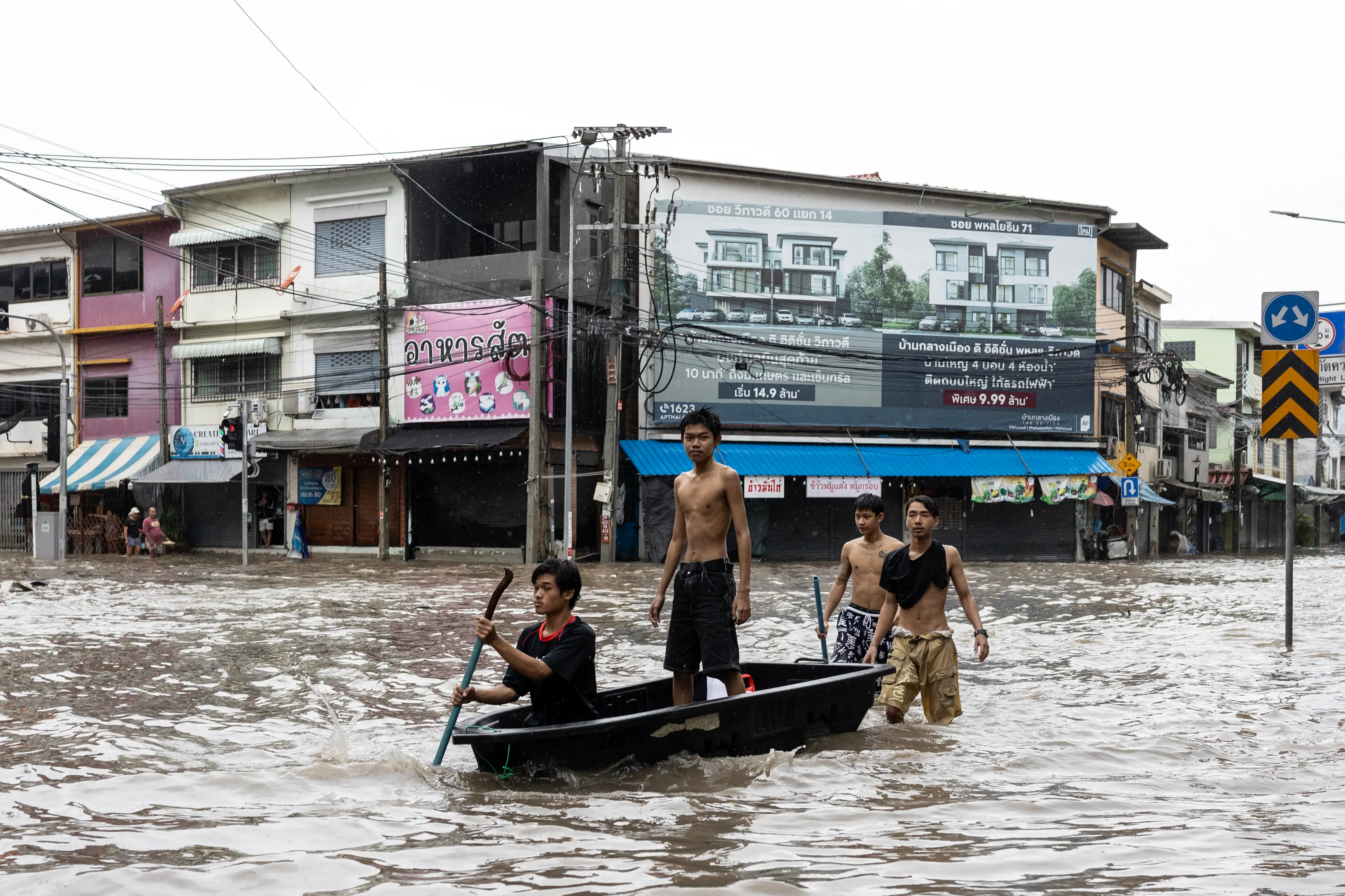 Bangkok declares flood disaster as heavy rain submerges roads and homes