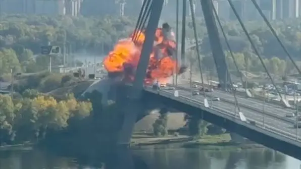 Russian drone hits Kyiv bridge in broad daylight, triggering huge fireball | VIDEO