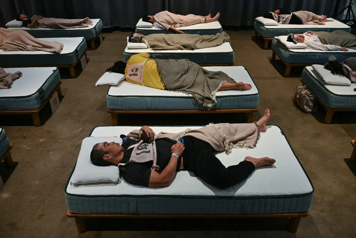 Japanese compete to be named fastest and deepest sleeper in unique contest