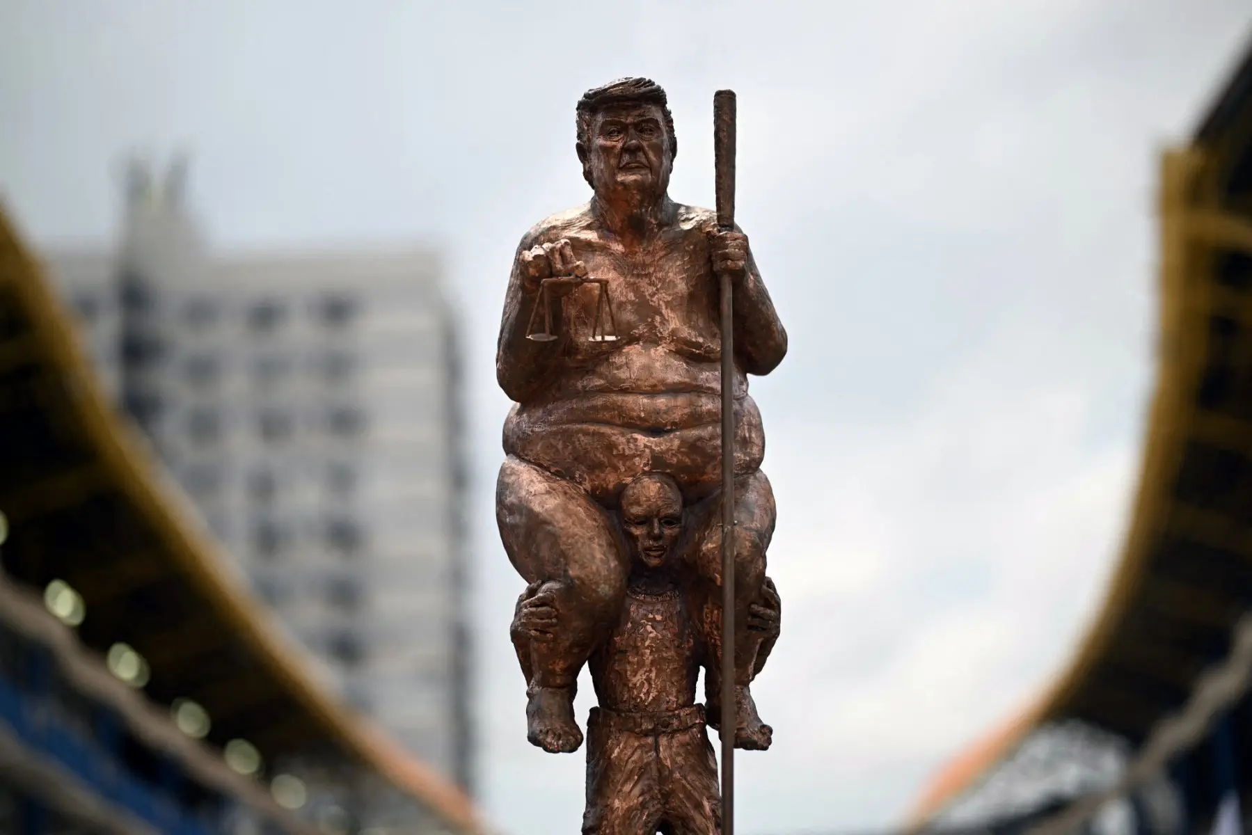 Trump's naked 23-karat gold statue unveiled near European Parliament