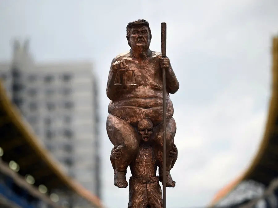 Trump's naked 23-karat gold statue unveiled near European Parliament
