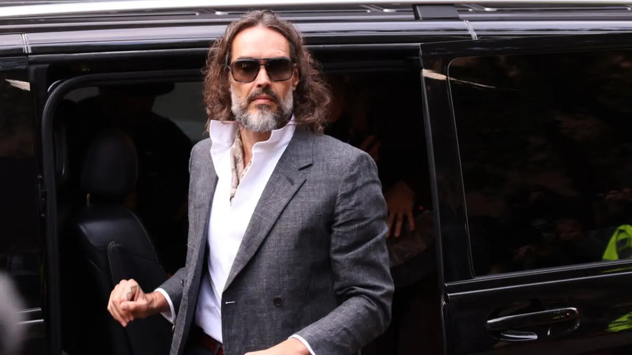 Russell Brand's sexual assault trial begins; comedian appears in London court with wife Laura Gallacher