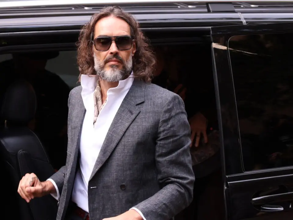 Russell Brand's sexual assault trial begins; comedian appears in London court with wife Laura Gallacher Russell Brand's sexual assault trial begins; comedian appears in London court with wife Laura Gallacher