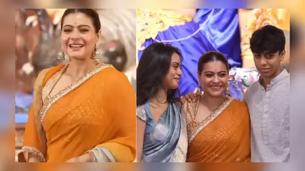 Kajol stuns in a orange-grey saree at Durga puja, poses with kids, Nysa and Yug - Watch Kajol stuns in a orange-grey saree at Durga puja, poses with kids, Nysa and Yug - Watch