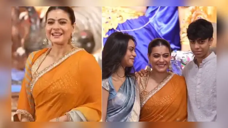 Kajol stuns in a orange-grey saree at Durga puja, poses with kids, Nysa and Yug - Watch Kajol stuns in a orange-grey saree at Durga puja, poses with kids, Nysa and Yug - Watch