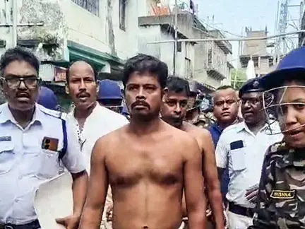 Kolkata Police parade accused shirtless during Behala assault case reconstruction Kolkata Police parade accused shirtless during Behala assault case reconstruction