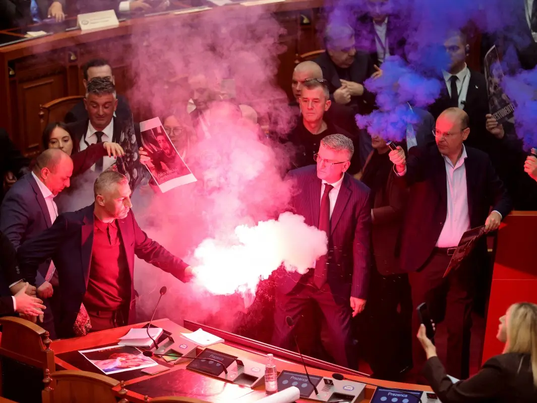 Dramatic scenes unfold in Albanian parliament as lawmakers set off flares, smoke bombs amid anti-government protests Dramatic scenes unfold in Albanian parliament as lawmakers set off flares, smoke bombs amid anti-government protests